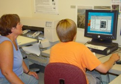 Teacher student working together on a GIS project