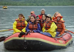 Group of students in a raft