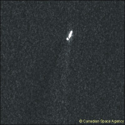 Radar image with a boat reflecting as a bright target